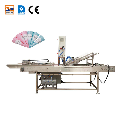 อุปกรณ์อัตโนมัติอุตสาหกรรม Cone Sleeving สําหรับการทํางานง่าย 220V / 380V พลังงานไฟฟ้า