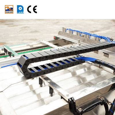 อุปกรณ์อัตโนมัติสแตนเลส Cone Sleeving สําหรับเครื่องกลมกลมน้ําตาล