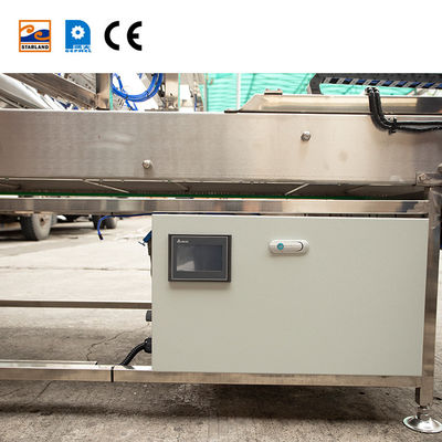 อุปกรณ์อัตโนมัติสแตนเลส Cone Sleeving สําหรับเครื่องกลมกลมน้ําตาล